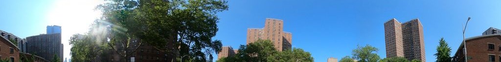 Street-level daytime example from Downtown Manhattan Nyc, cropped to the local street backdrop.