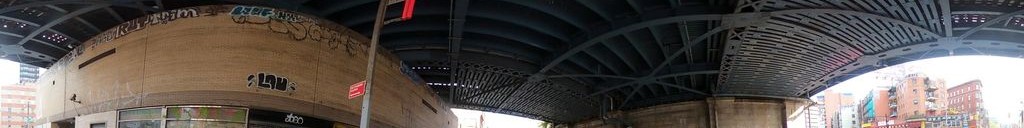 Street-level low light example from Downtown Manhattan Nyc, cropped to the local street backdrop.