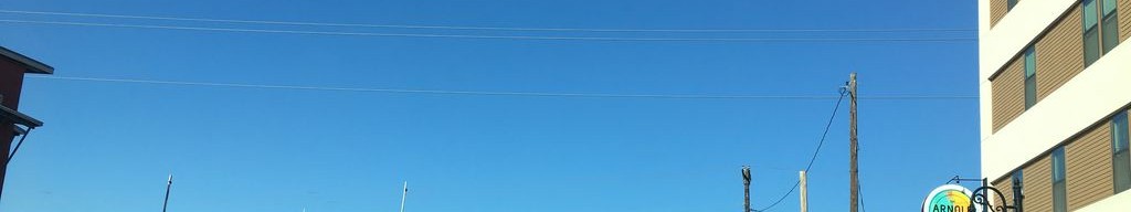 Street-level daytime example from East Austin, cropped to the local street backdrop.