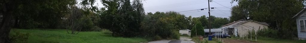 Street-level low light example from East Austin, cropped to the local street backdrop.