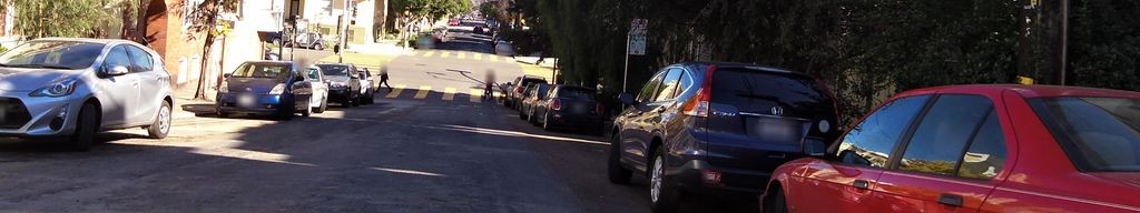 Street-level low light example from Mission Sf, cropped to the local street backdrop.