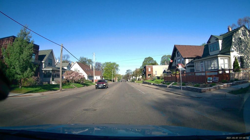 Street-level low light example from Northeast Minneapolis, cropped to show the local street context.