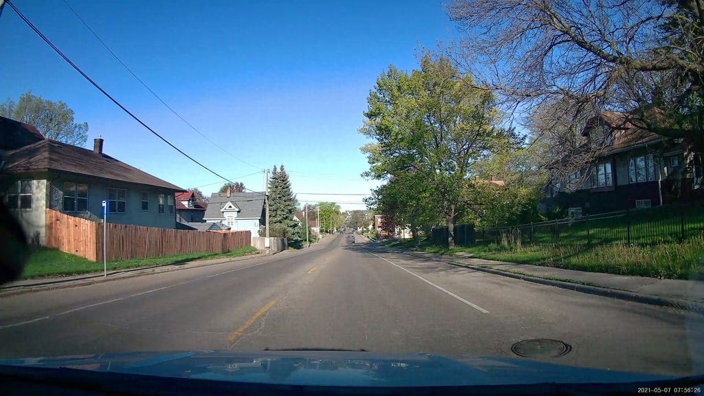 Street-level low light example from Northeast Minneapolis, cropped to show the local street context.