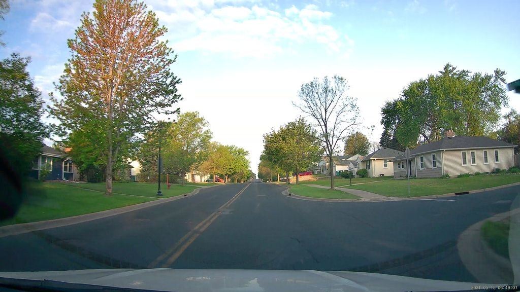 Street-level low light example from Northeast Minneapolis, cropped to show the local street context.