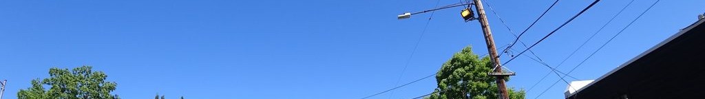 Street-level daytime example from Portland Central Eastside, cropped to the local street backdrop.