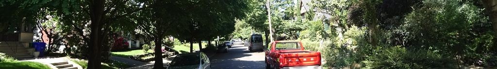 Street-level low light example from Portland Central Eastside, cropped to the local street backdrop.