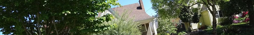 Street-level low light example from Portland Central Eastside, cropped to the local street backdrop.