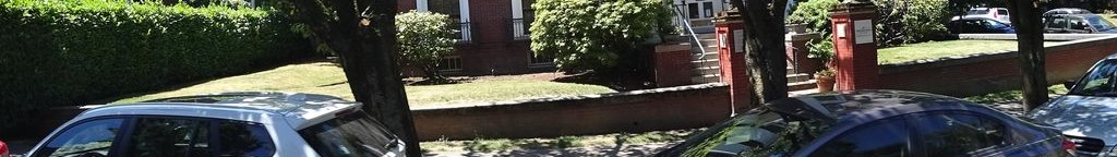 Street-level low light example from Portland Downtown Pearl, cropped to the local street backdrop.