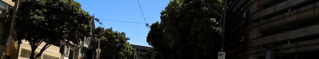 Street-level low light example from Richmond Sunset Sf, cropped to the local street backdrop.