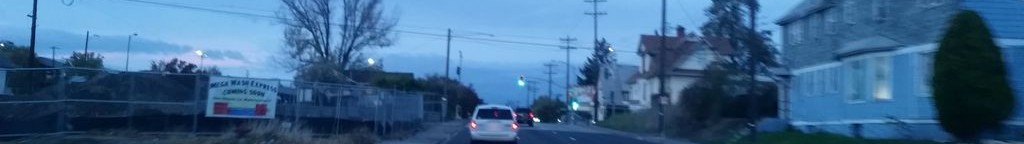 Street-level low light example from Spokane, cropped to the local street backdrop.