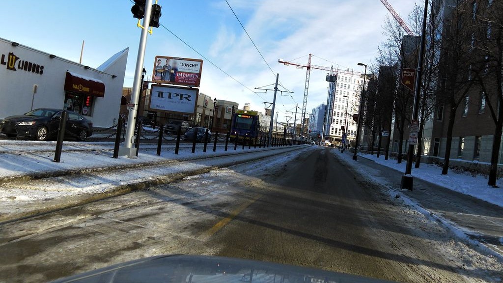 Street-level low light example from University Dinkytown Minneapolis, cropped to show the local street context.